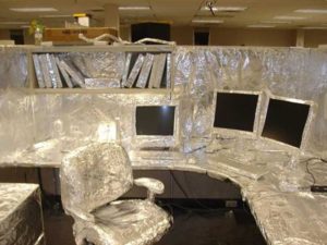 Foil/saran wrap a cubicle